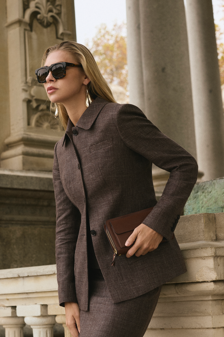 Elegant women’s custom brown skirt suit tailored in Jacksonville Florida perfect for executive meetings and evening receptions#powerdressing #customwomensuits #jacksonvillestyle #businessfashion #zaneexclusive