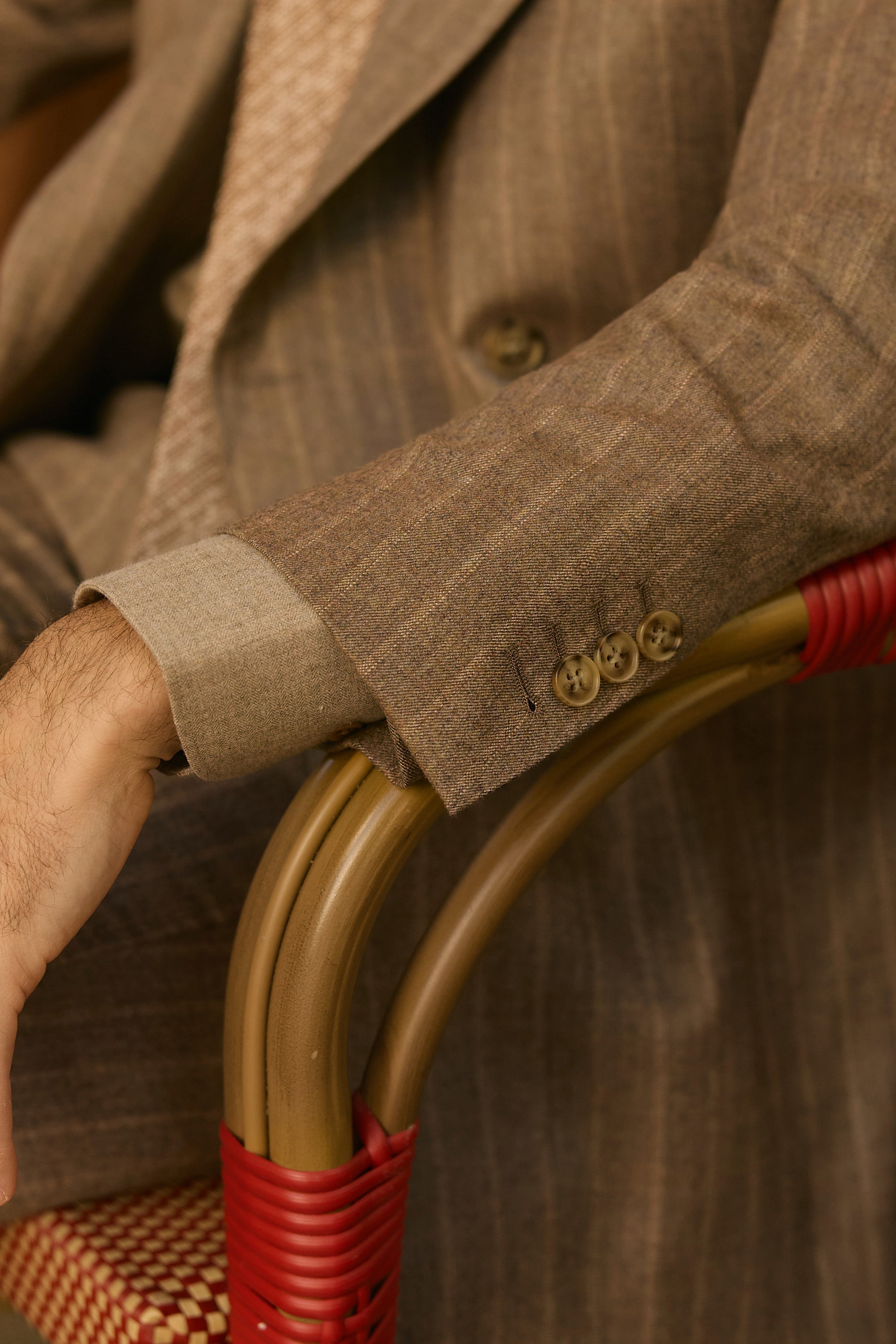 Custom men’s brown wool suit sleeve and shirt cuff detail tailored in Jacksonville Florida for modern fit and fall style#customsuits #tailoredshirts #jacksonvilleflorida #menswear #zanesuits