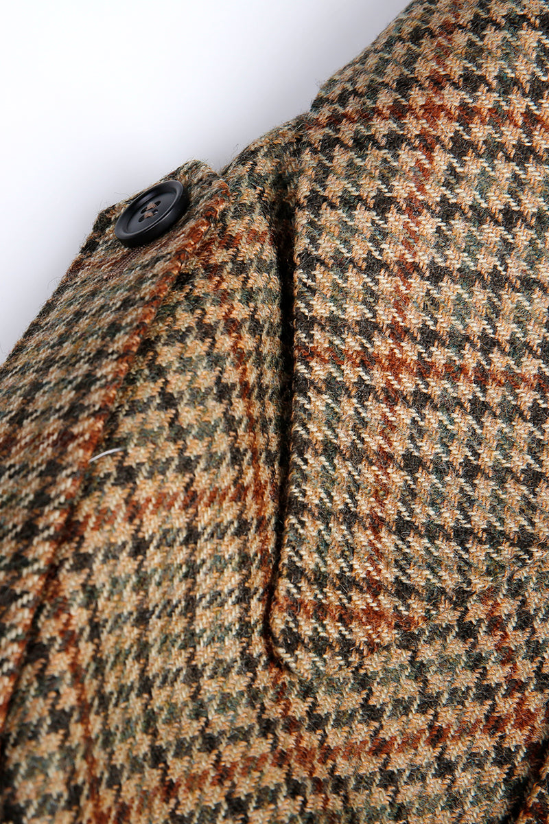 Close-up of a textured fabric with a checkered pattern on a white background plaid wool custom overcoats for women online