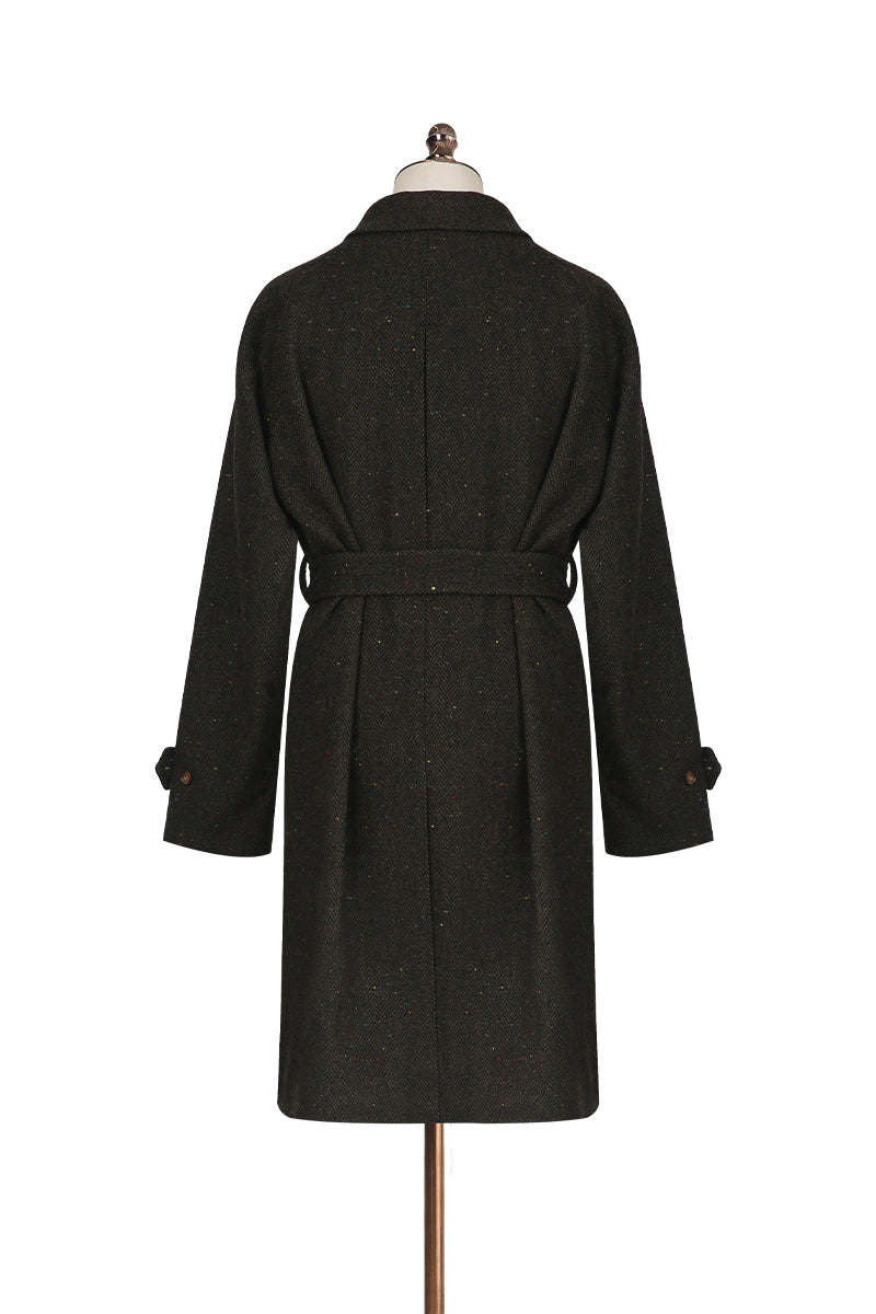 Dark gray coat on a mannequin against a white background