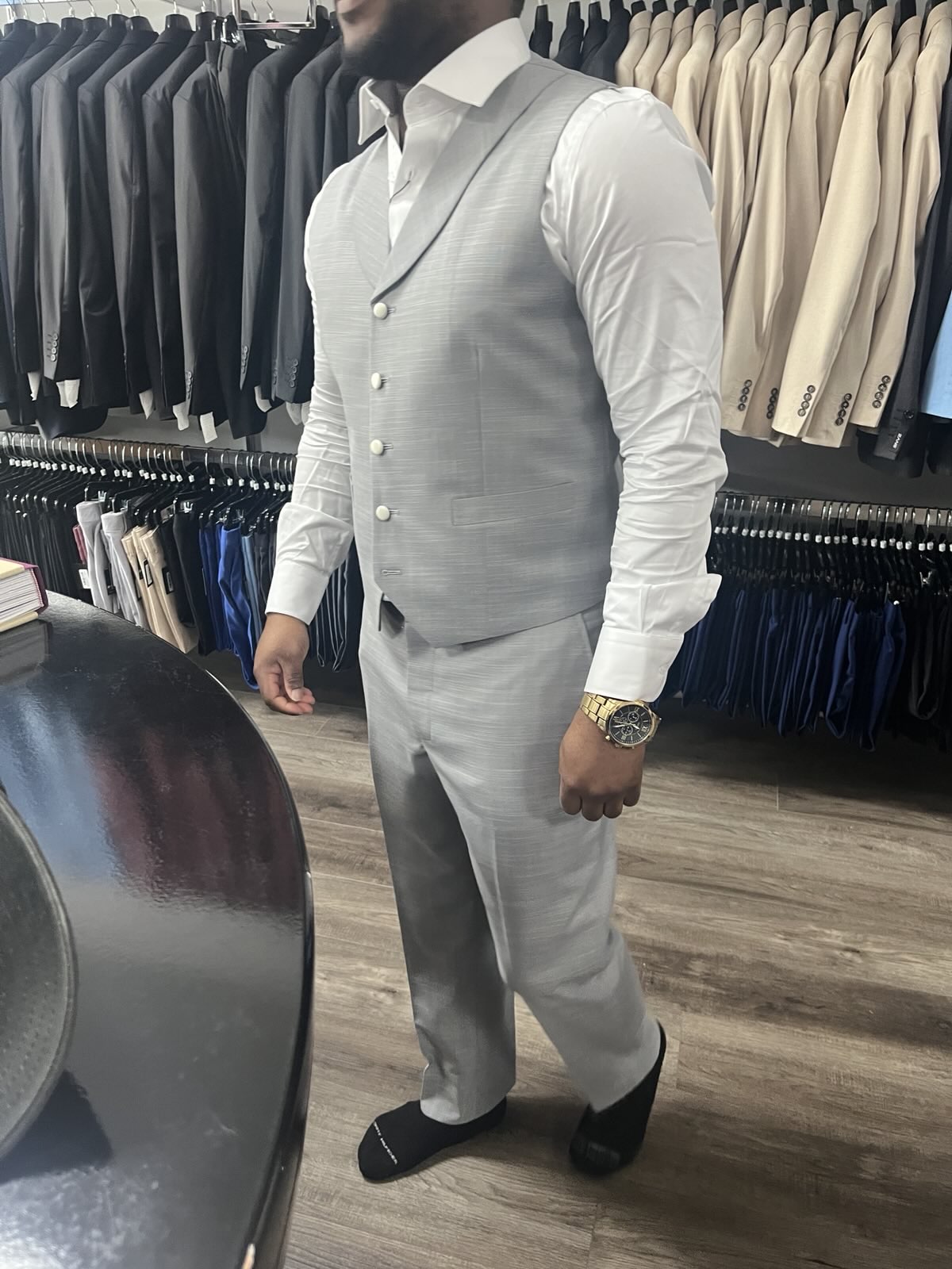 Light gray custom suit in Jacksonville Florida with white shirt and vest for weddings and formal events #jacksonvilleflorida #customsuits #weddingstyle2025 #lightgraysuit #zaneexclusive