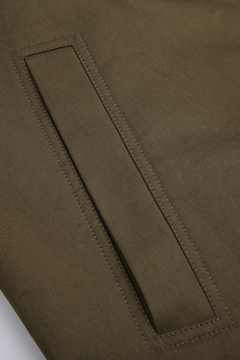 Close-up of a brown fabric with a seam detail