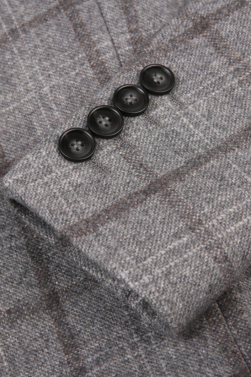 Close-up of a gray textured fabric with black buttons women business formalwear