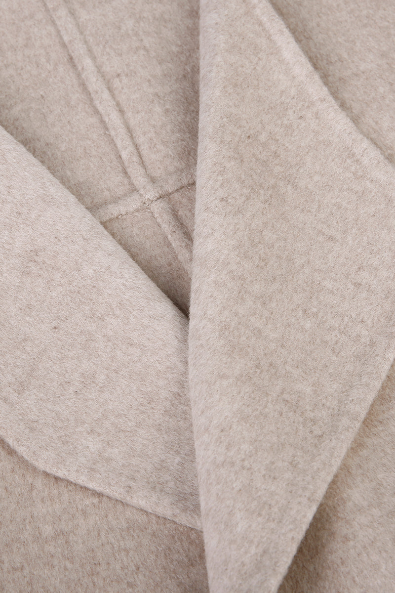 Close-up of beige fabric with a subtle pattern