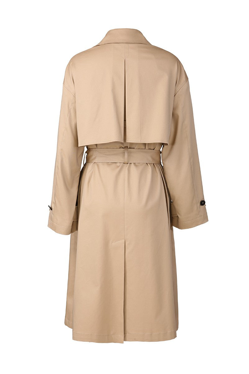 Beige trench coat on a white background