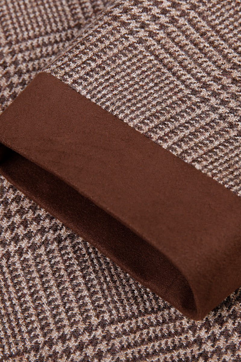 Close-up of brown fabric with a houndstooth pattern
