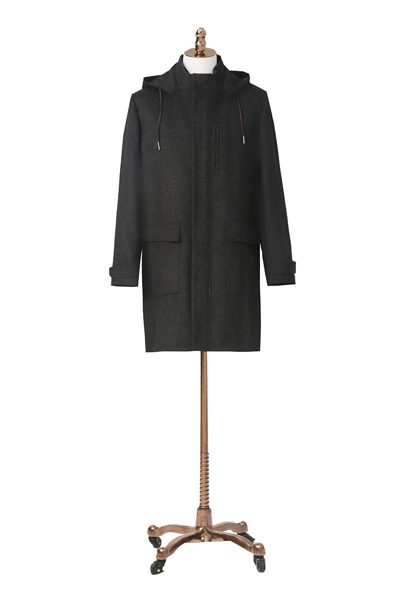 Black coat on a mannequin with a white background