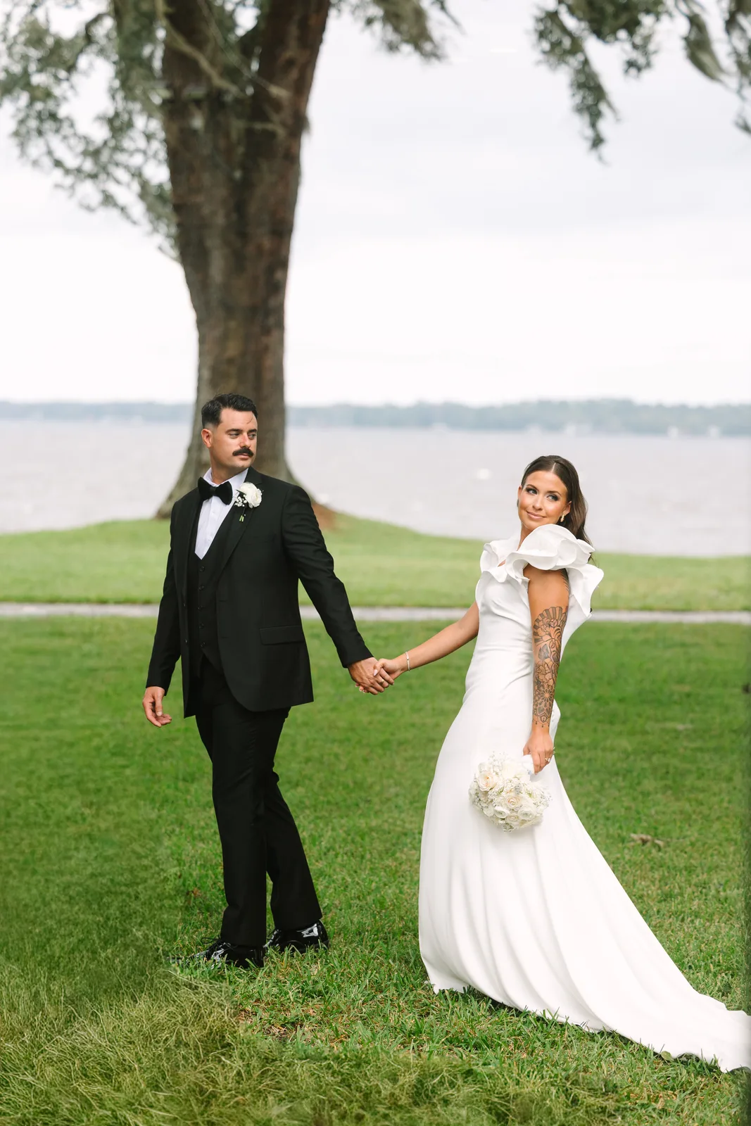 Groom in a custom wedding suit by Zane in Jacksonville